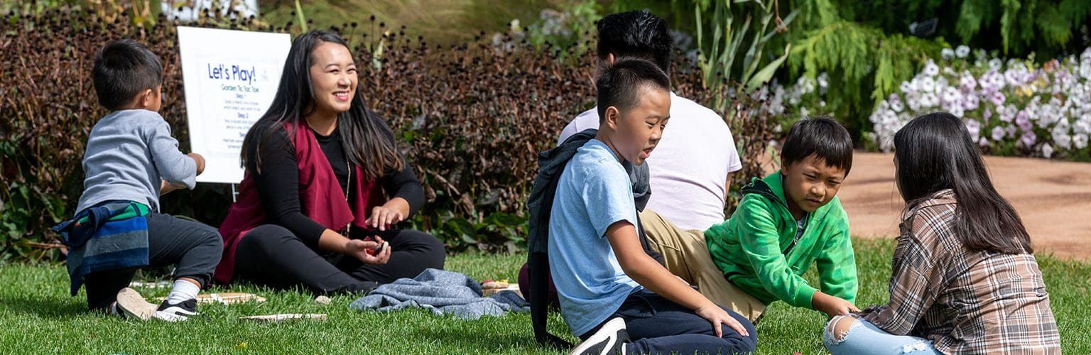 Family enjoying Fall Family Festival activity